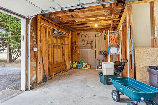 a front view of house with yard and trees