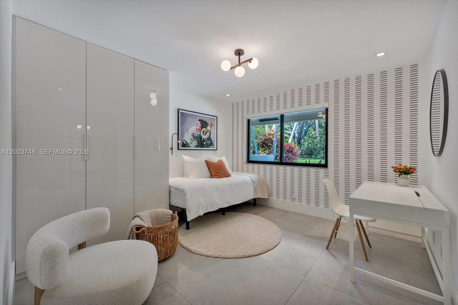 2675 Hackney Road Weston, FL 33331 - Photo 52 of 61 a living room with furniture and a window