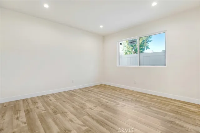 a bathroom with a toilet sink and shower