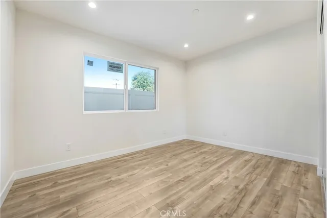 a view of a living room with a washer and dryer