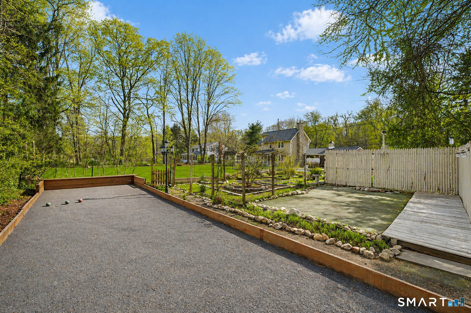 602 Durham Road Madison, CT 06443 - Photo 27 of 34 Bocce ball and putting green sit ideally next to your garden