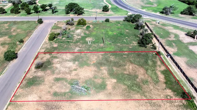 a view of a garden from a balcony