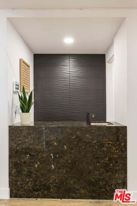 1210 North Kings Road, Unit 101 West Hollywood, CA 90069 - Photo 13 of 32 a bathroom with a sink and a shower