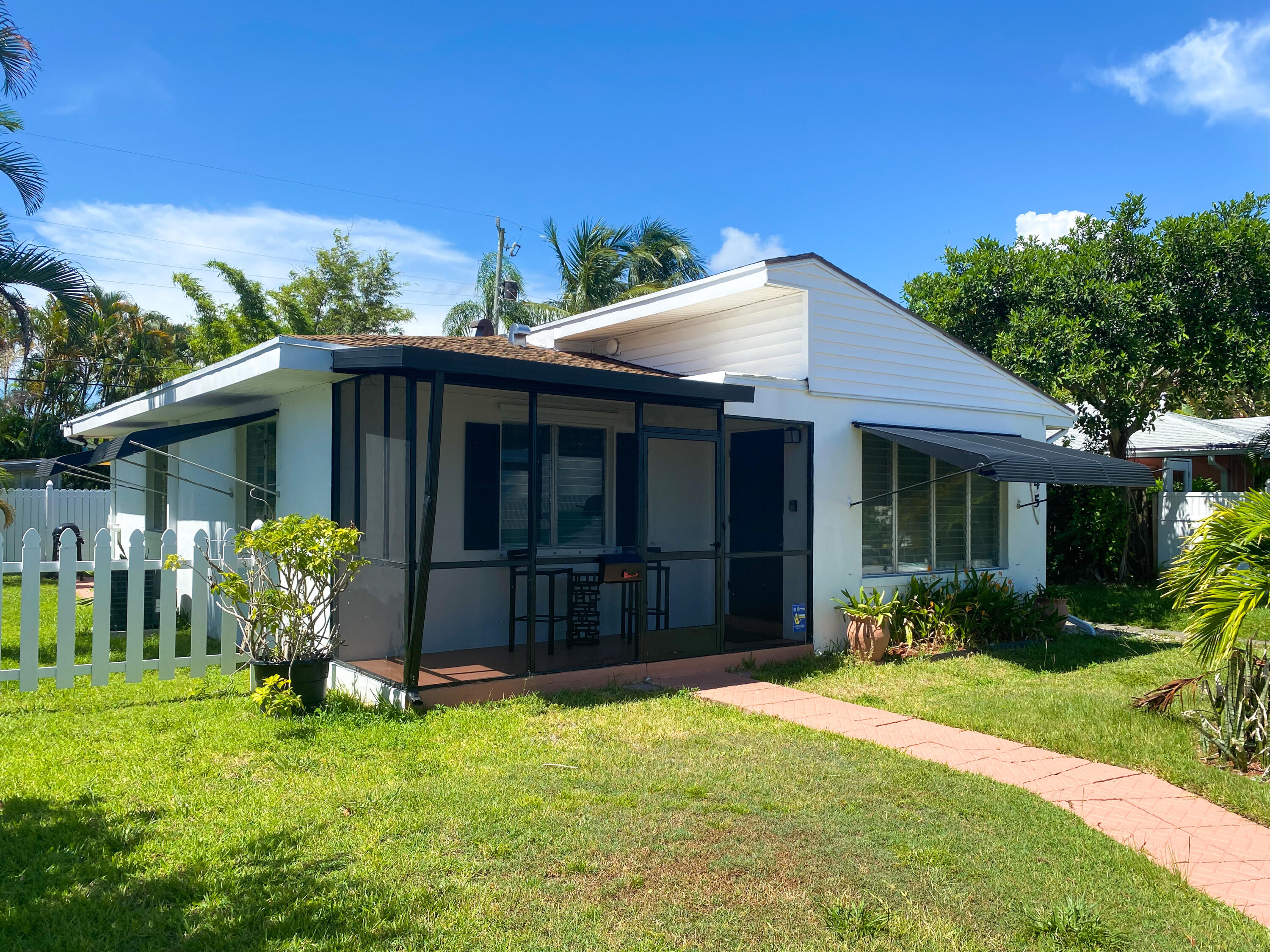 245 East 25th Street Riviera Beach, FL 33404 - Photo 1 of 23 Front Exterior