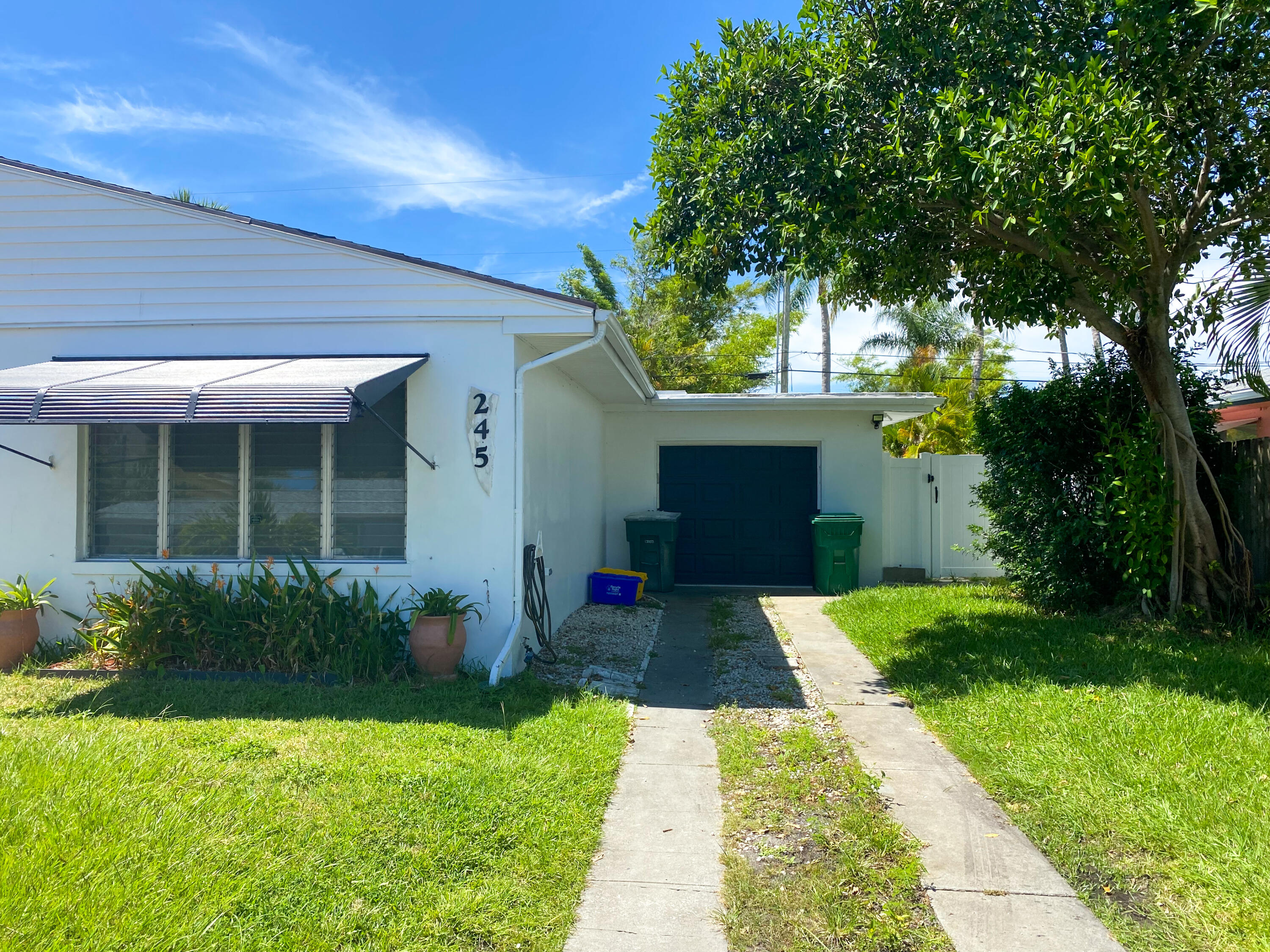 245 East 25th Street Riviera Beach, FL 33404 - Photo 3 of 23 Garage Exterior