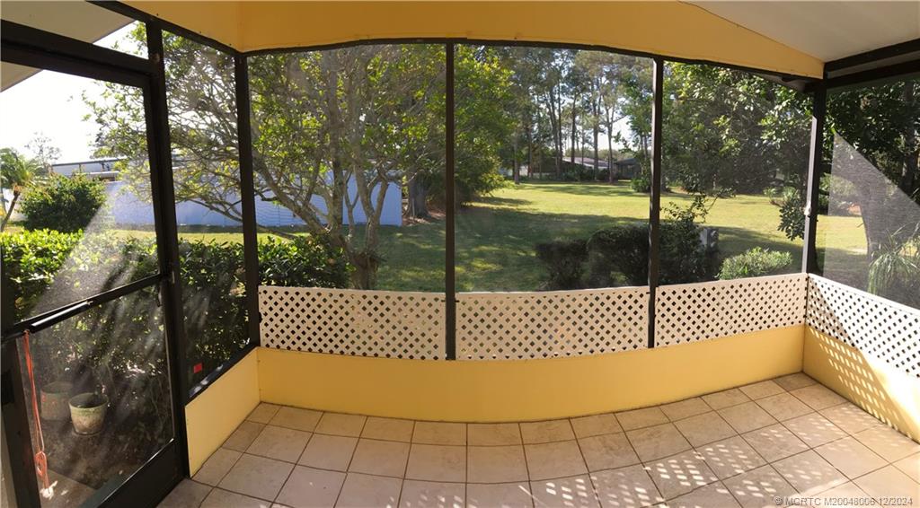 16222 Southwest Five Wood Way Indiantown, FL 34956 - Photo 3 of 13 a view of a street view from a balcony