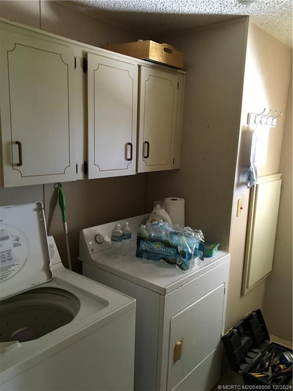 16222 Southwest Five Wood Way Indiantown, FL 34956 - Photo 9 of 13 a close view of sink and washer