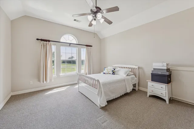 a bathroom with a sink a double vanity and a mirror