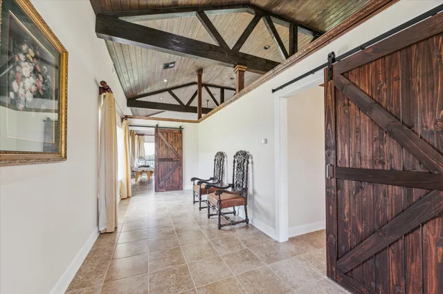 a view of a workspace with furniture