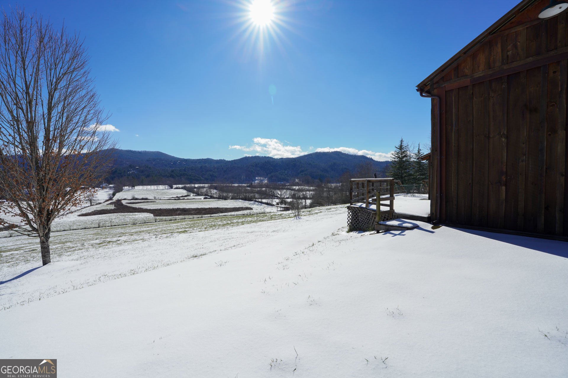 5192 Wolffork Road Rabun Gap, GA 30568 - Photo 18 of 63 a view of a house with a yard