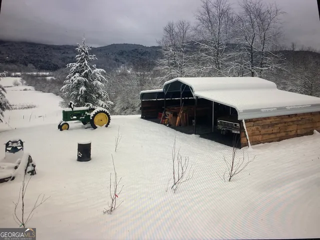 a view of a backyard of a house