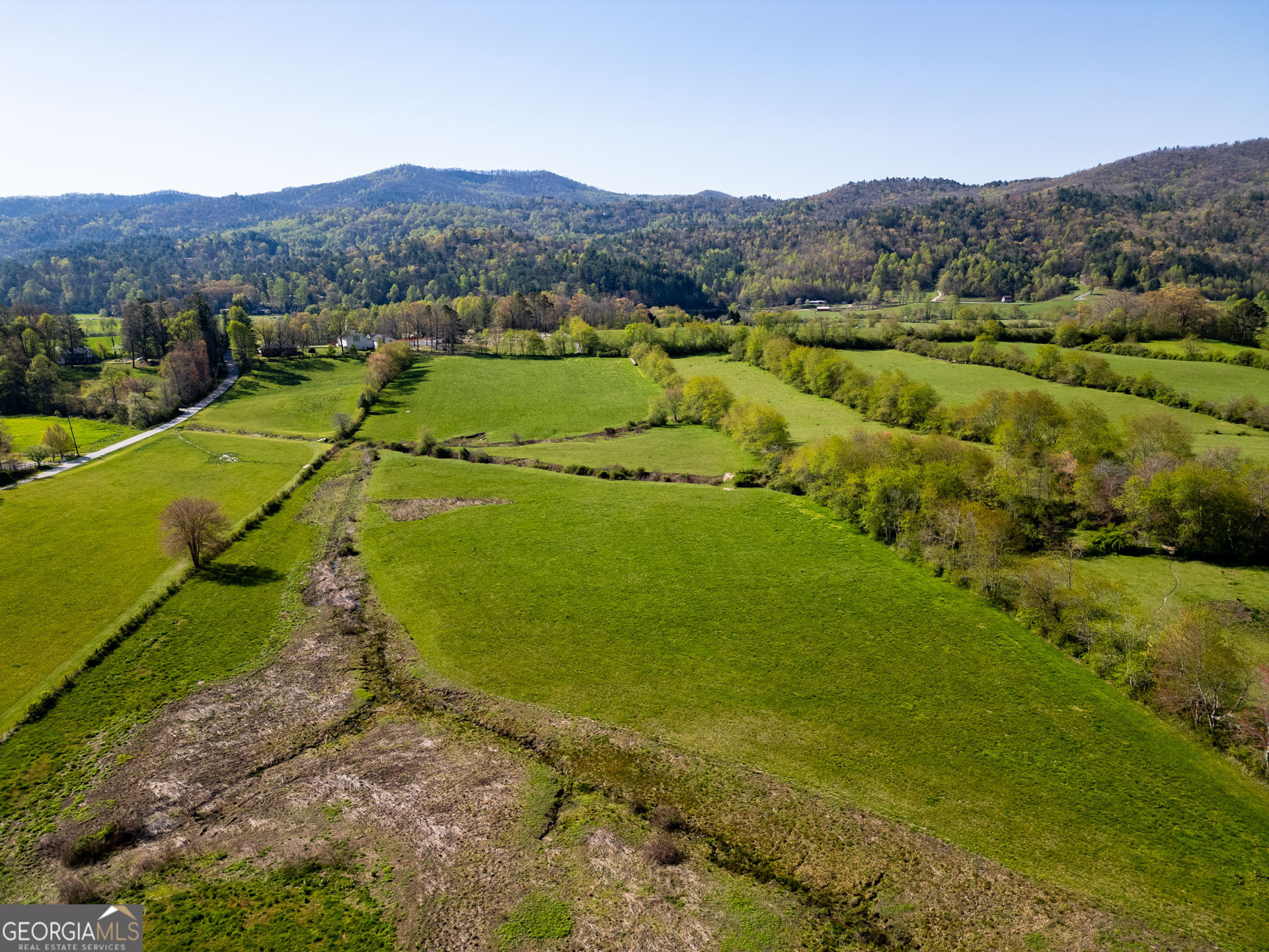 5192 Wolffork Road Rabun Gap, GA 30568 - Photo 36 of 63 a view of a town with mountains in the background