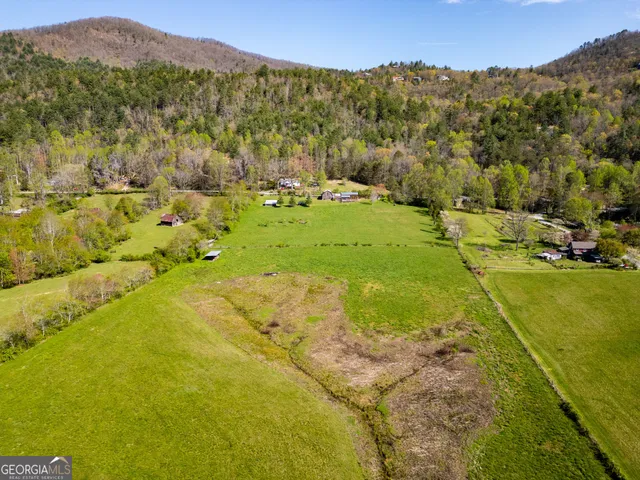 a view of lake with mountain