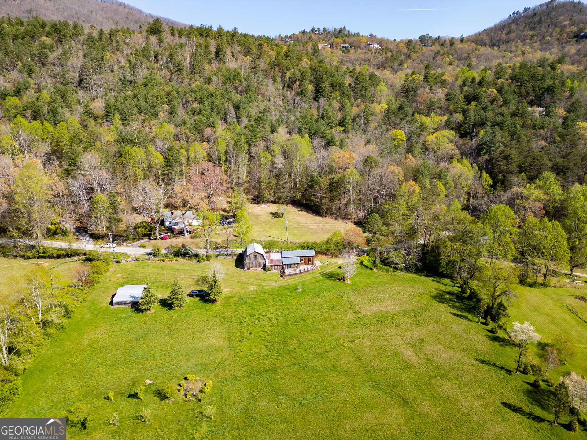 5192 Wolffork Road Rabun Gap, GA 30568 - Photo 49 of 63 a view of a yard with an outdoor space