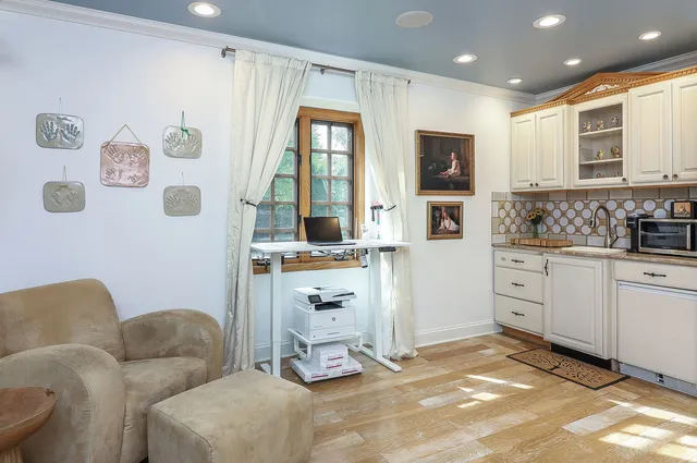 a bathroom with a double vanity sink mirror and shower