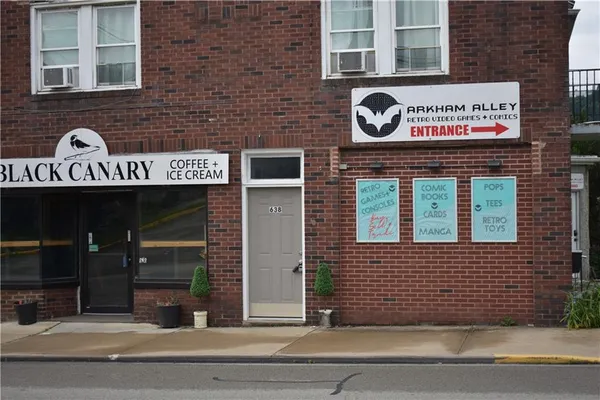 a view of a brick building with entryway
