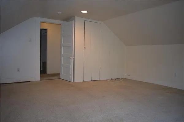 an empty room with an entryway
