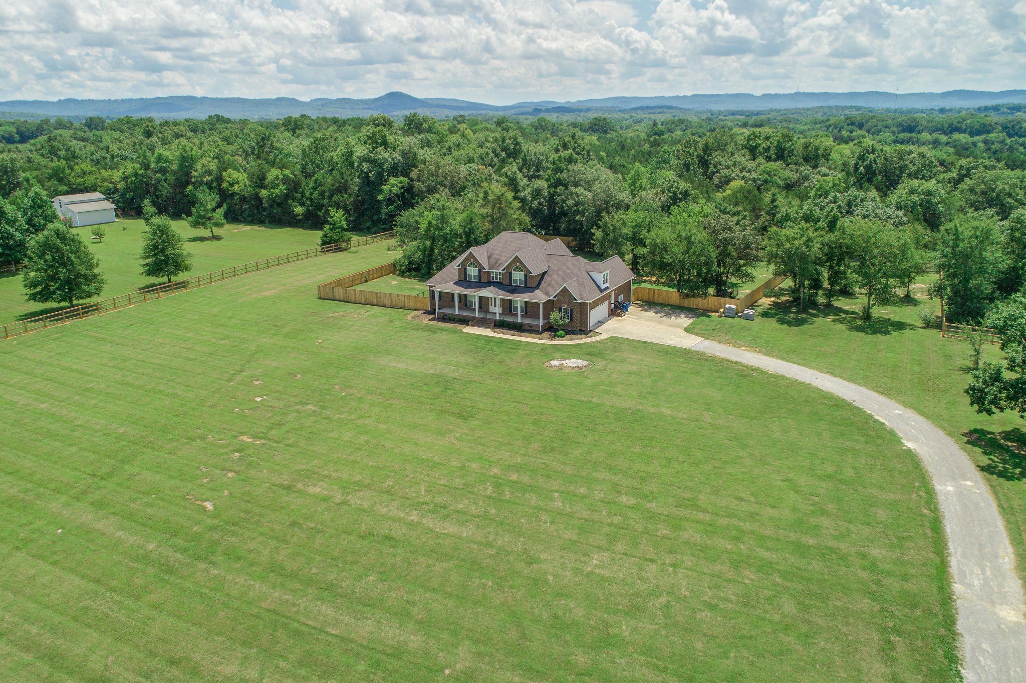 8460 East Gum Road Murfreesboro, TN 37127 - Photo 3 of 30 Property Fully FENCED! Fencing in front and back with added layer of Privacy Fencing!