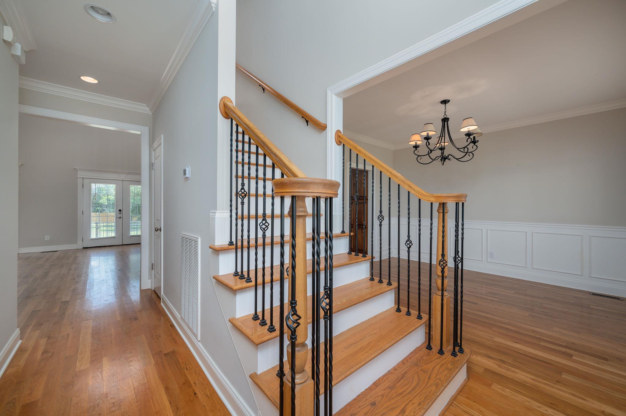 8460 East Gum Road Murfreesboro, TN 37127 - Photo 6 of 30 Beautiful Entryway with Hardwood Treads on stairs. Formal Dining & Office on either side of Entryway.