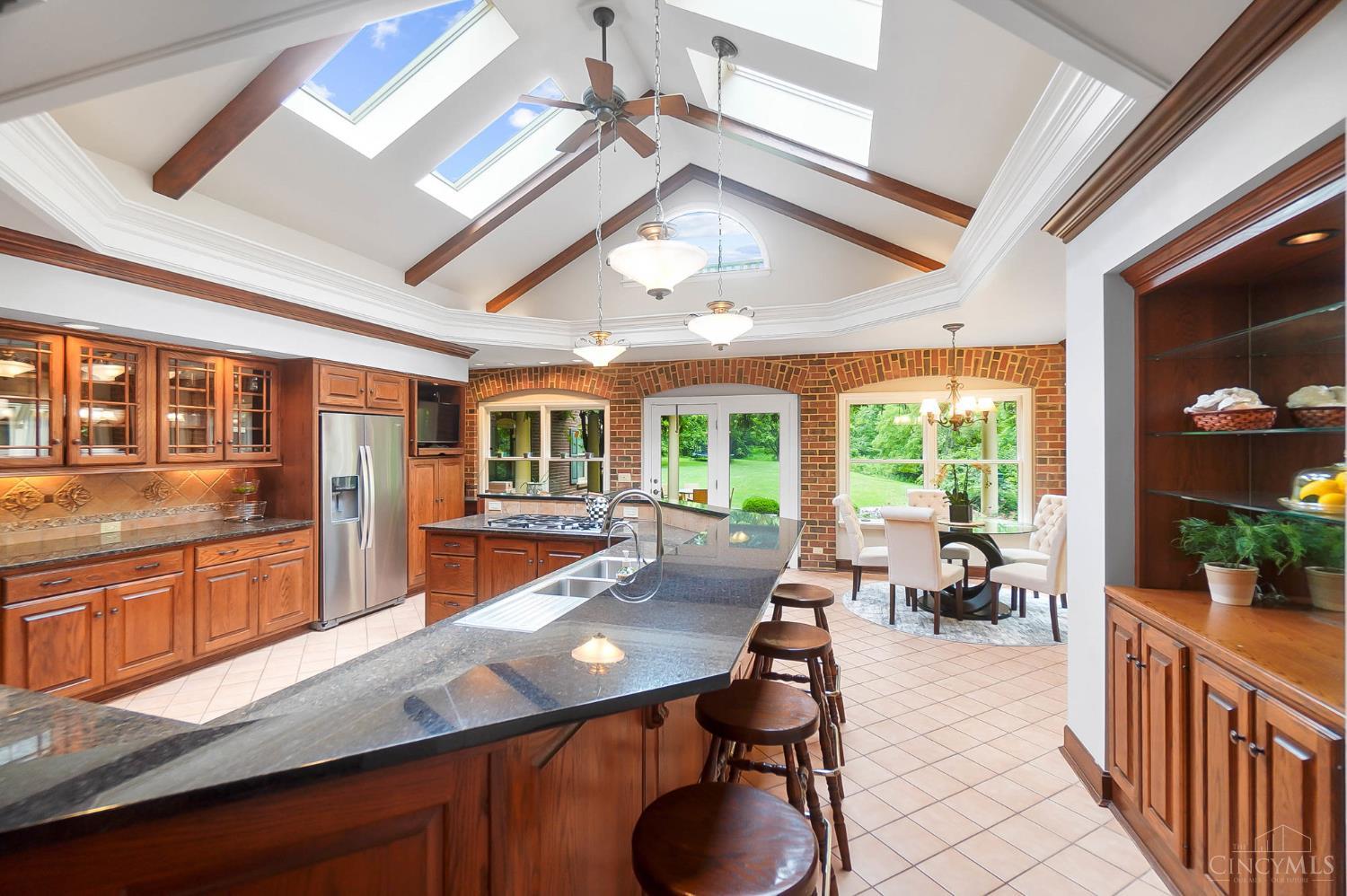 8000 Graves Road Cincinnati, OH 45243 - Photo 13 of 85 Kitchen with Wood Beams and Vaulted Ceilings & Skylights