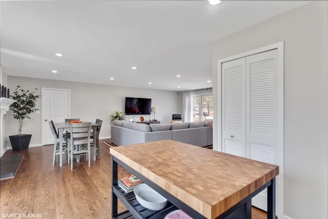 a kitchen with a table and chairs in it