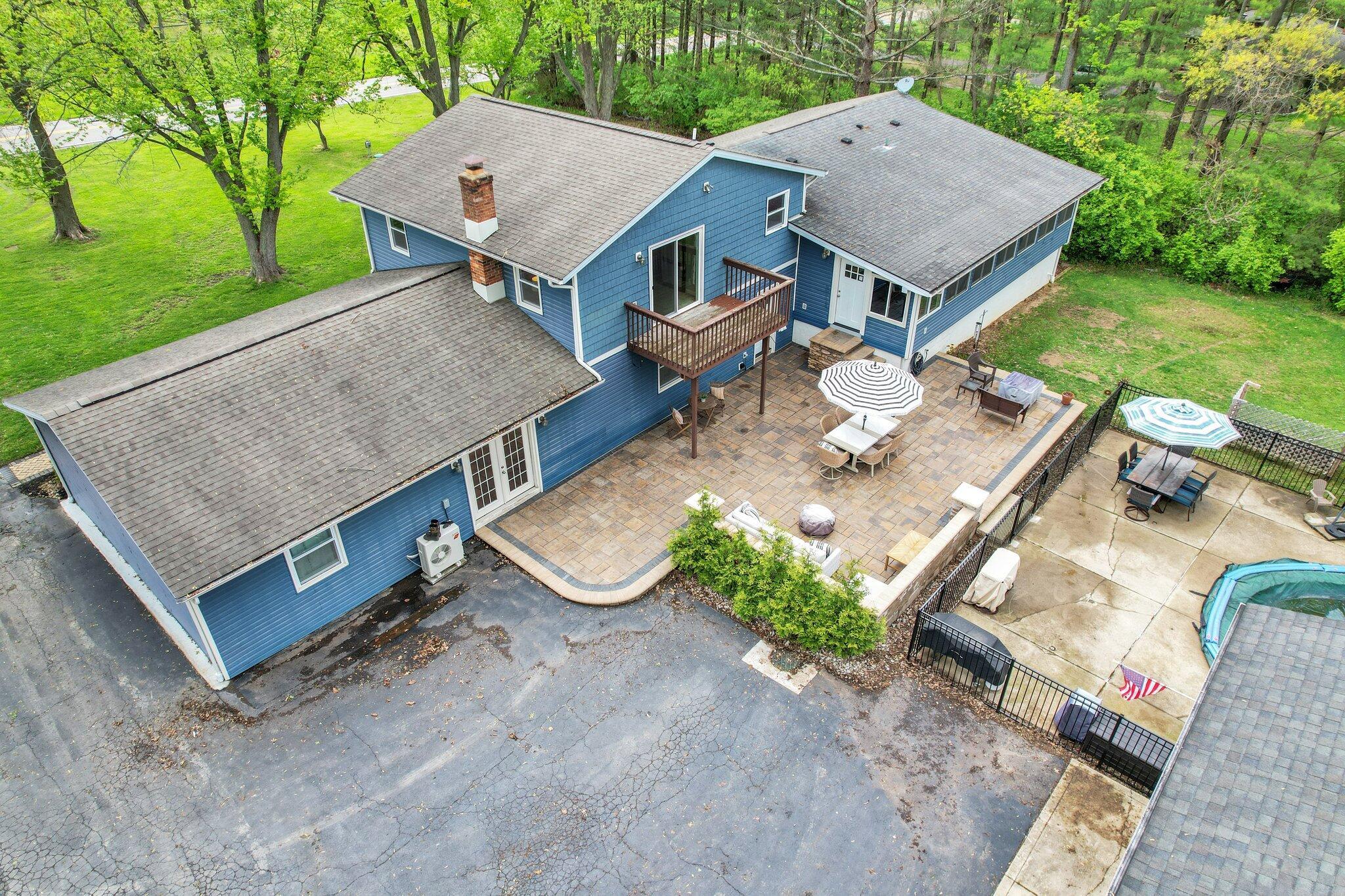 7790 Schott Road Westerville, OH 43081 - Photo 40 of 50 The space is so large it can easily accommodate several entertaining areas before you even get to the pool!