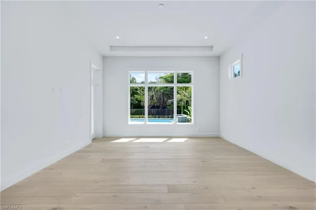 a bathroom with a shower sink and mirror