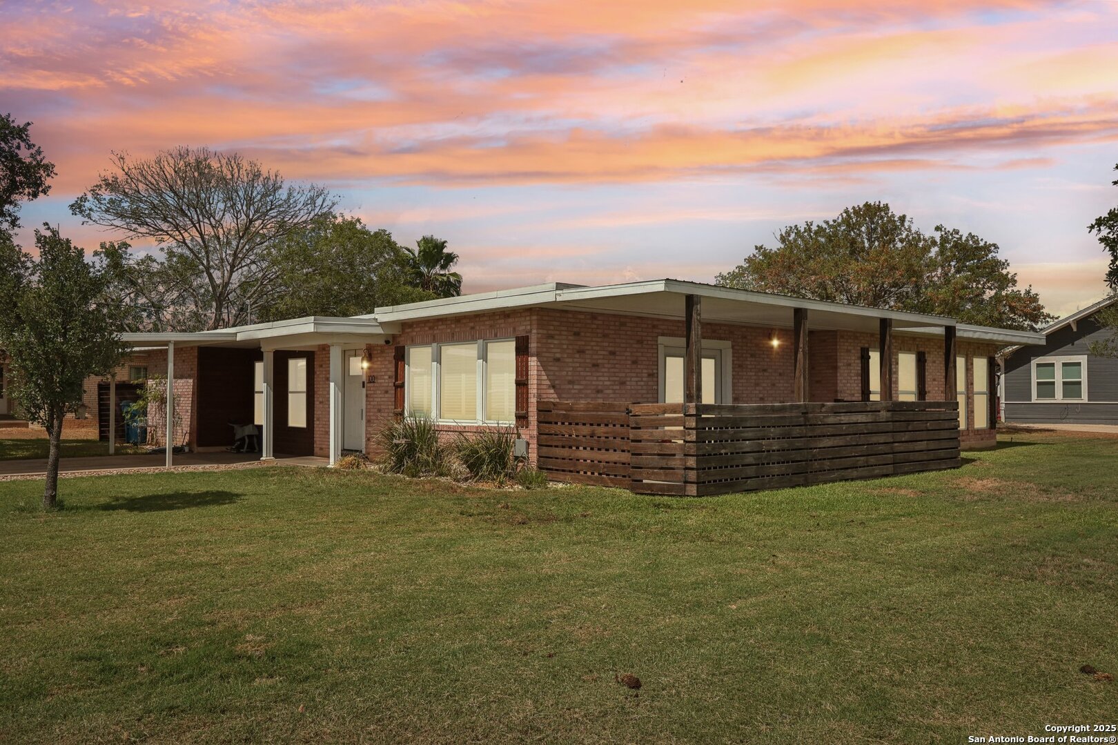 100 North Carroll Street Poth, TX 78147 - Photo 58 of 58 a front view of a house with a garden