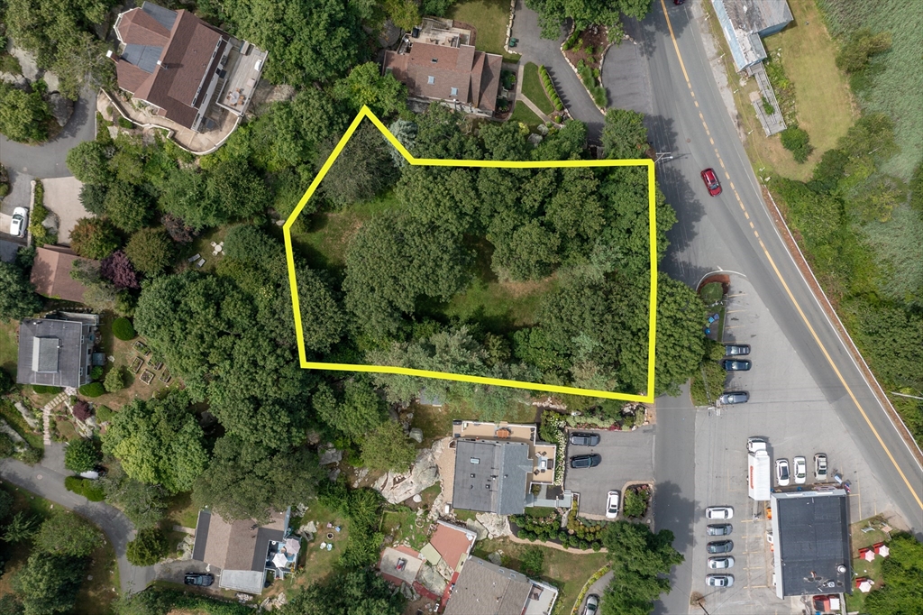 143 Thatcher Road Gloucester, MA 01930 - Photo 11 of 23 an aerial view of a house with a garden