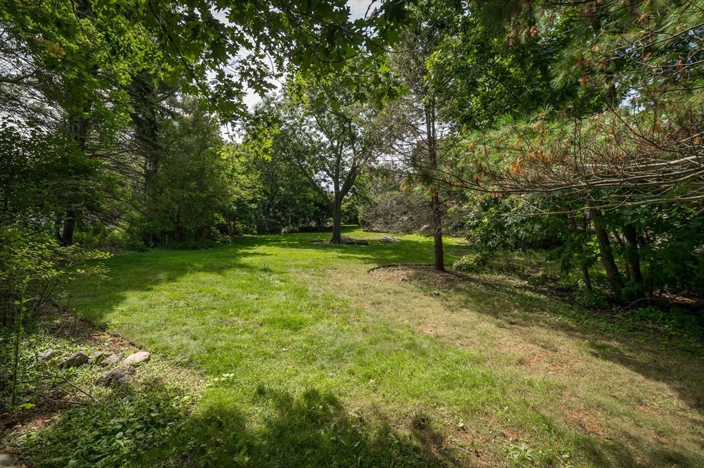 143 Thatcher Road Gloucester, MA 01930 - Photo 12 of 23 a view of outdoor space with deck and yard