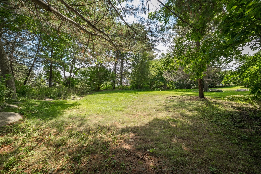 143 Thatcher Road Gloucester, MA 01930 - Photo 21 of 23 a view of outdoor space with a yard