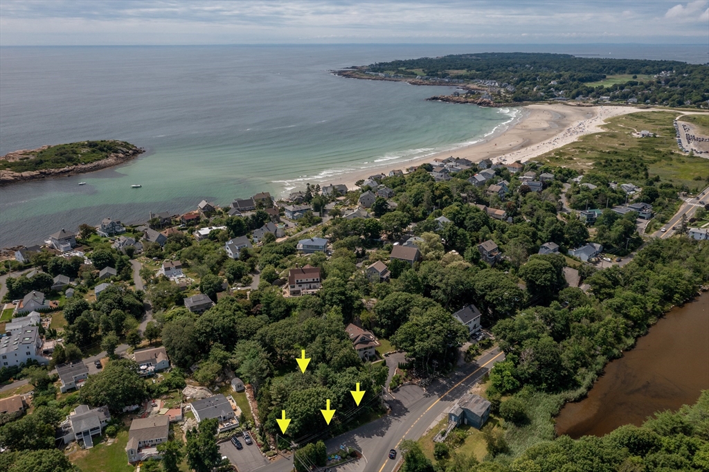 143 Thatcher Road Gloucester, MA 01930 - Photo 5 of 23 a view of a lake from a yard