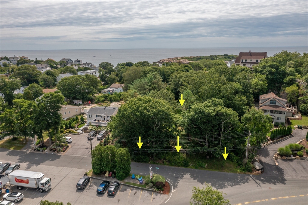 143 Thatcher Road Gloucester, MA 01930 - Photo 9 of 23 a view of a lake with houses