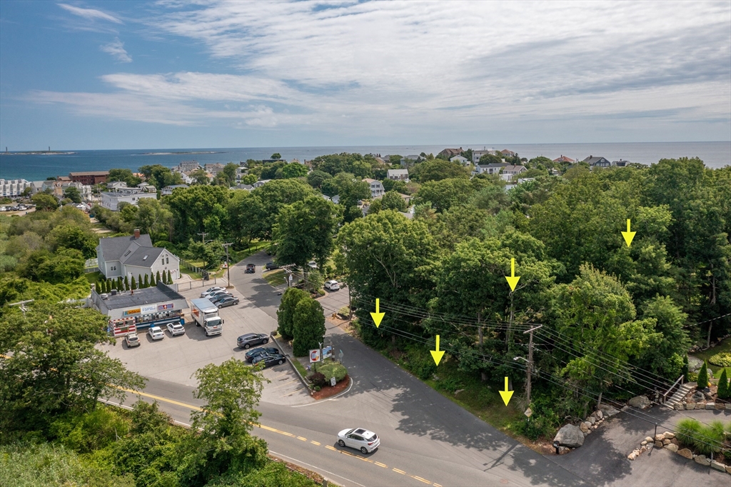 143 Thatcher Road Gloucester, MA 01930 - Photo 10 of 23 an aerial view of a city with lots of residential buildings