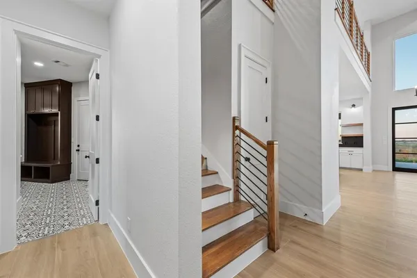 a view of entryway with wooden floor