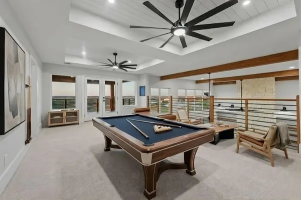 a room with furniture and a large window