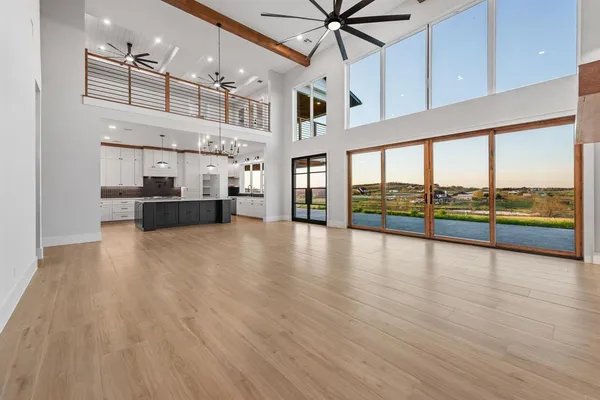 a view of an entryway with wooden floor