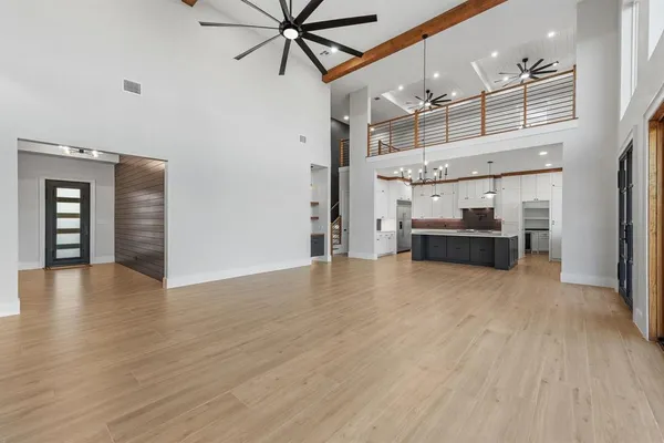 a view of a livingroom with a kitchen