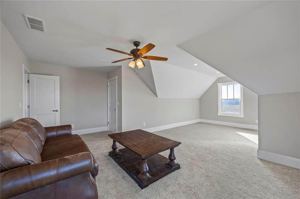 7588 Highway 98 Commerce, GA 30530 - Photo 39 of 50 a living room with furniture and a window
