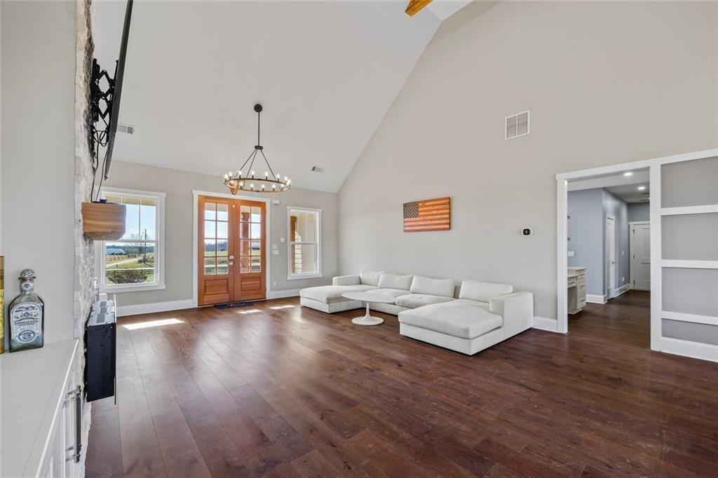 7588 Highway 98 Commerce, GA 30530 - Photo 9 of 50 a living room with furniture and wooden floor