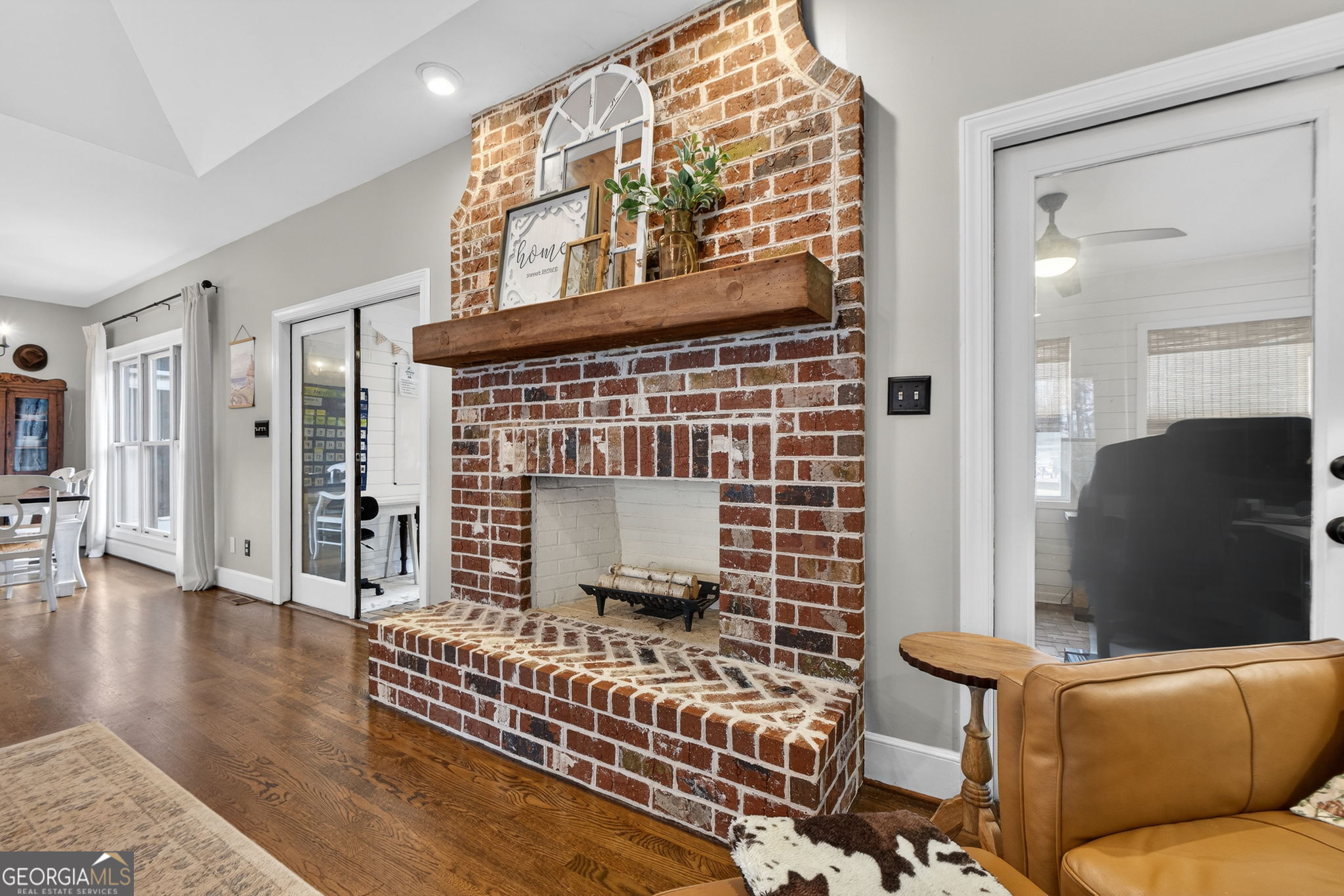 7581 Old Zebulon Road Molena, GA 30258 - Photo 15 of 79 a living room with furniture and a fireplace