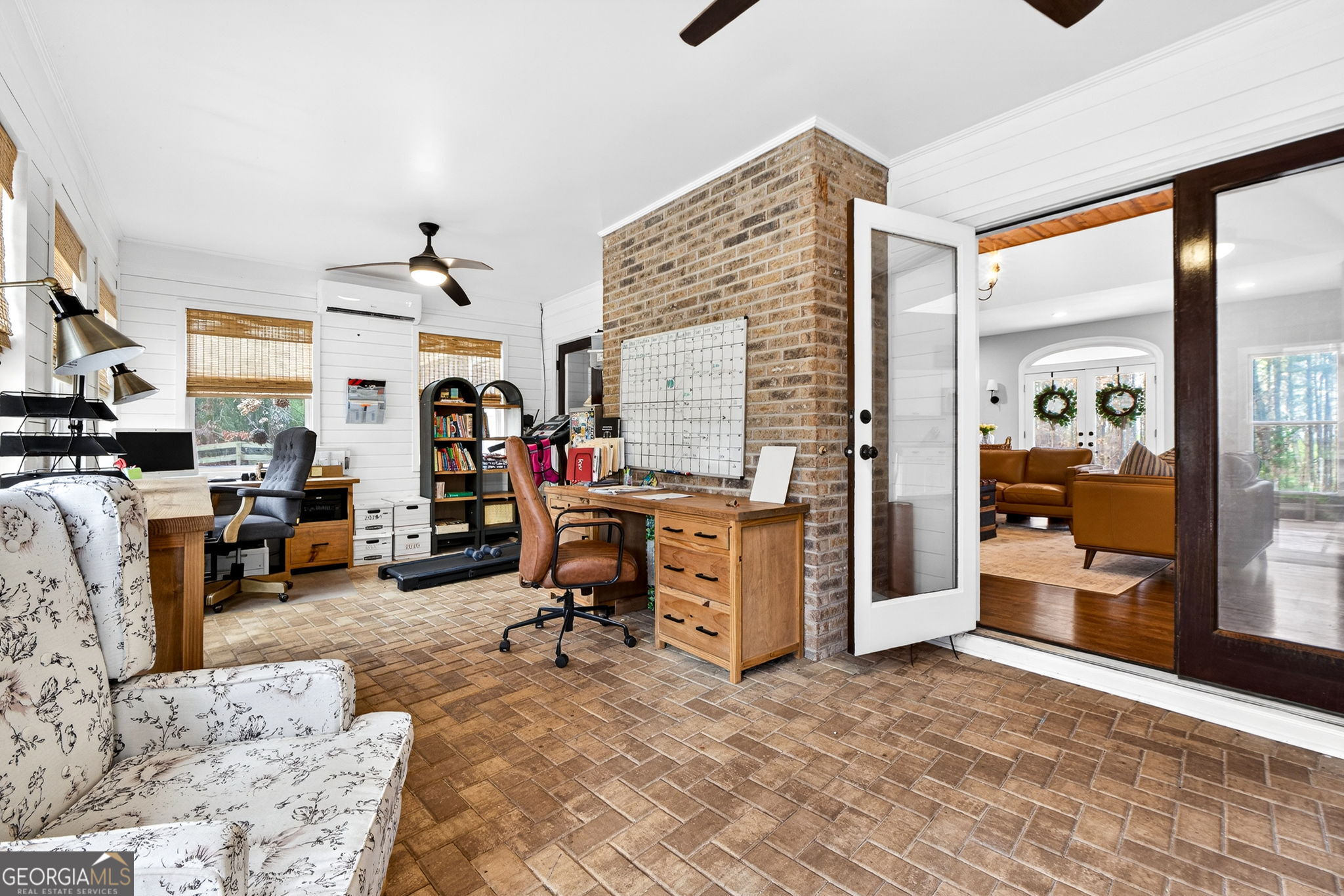 7581 Old Zebulon Road Molena, GA 30258 - Photo 27 of 79 a view of a livingroom with workspace and a window
