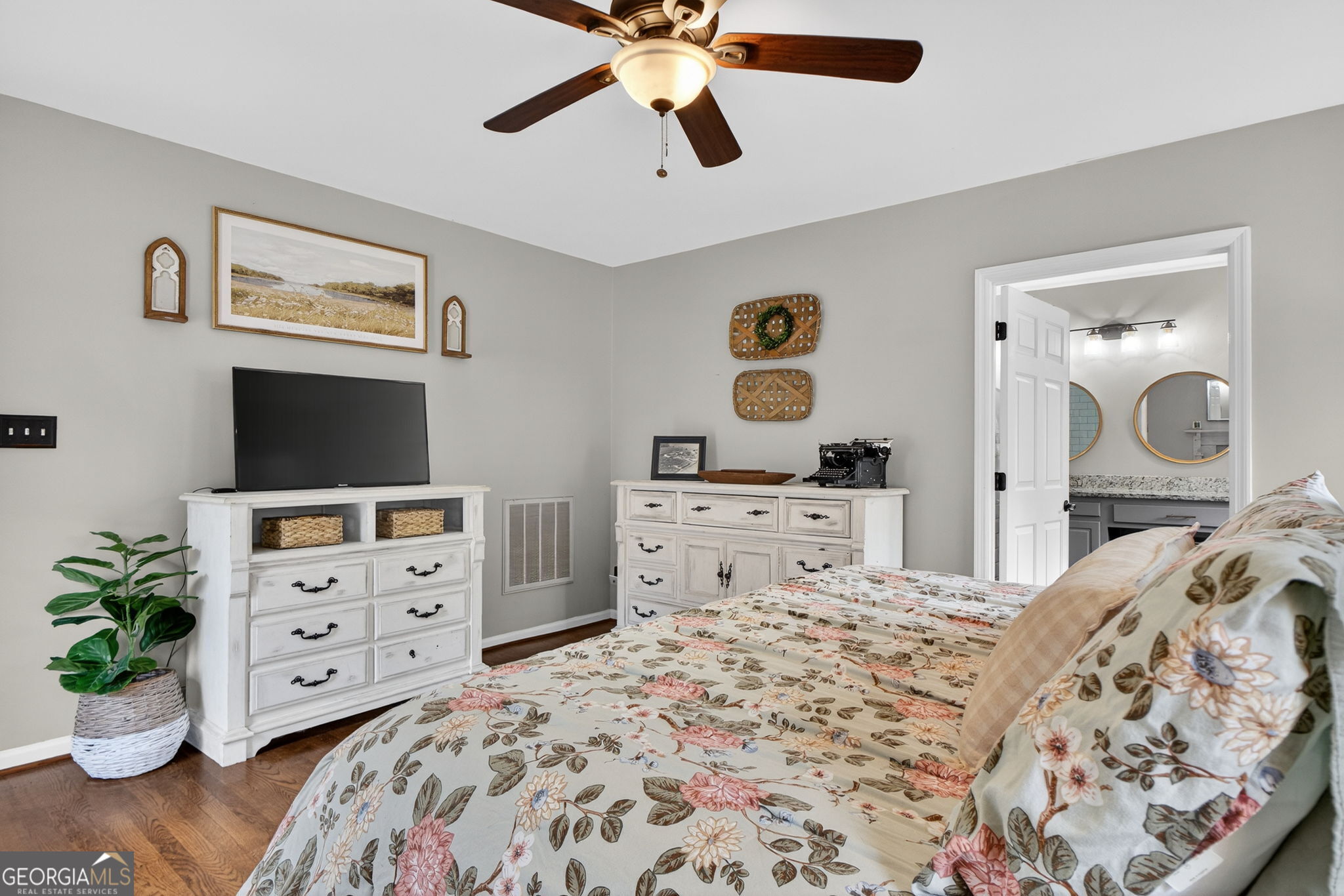 7581 Old Zebulon Road Molena, GA 30258 - Photo 34 of 79 a bedroom with a bed and furniture