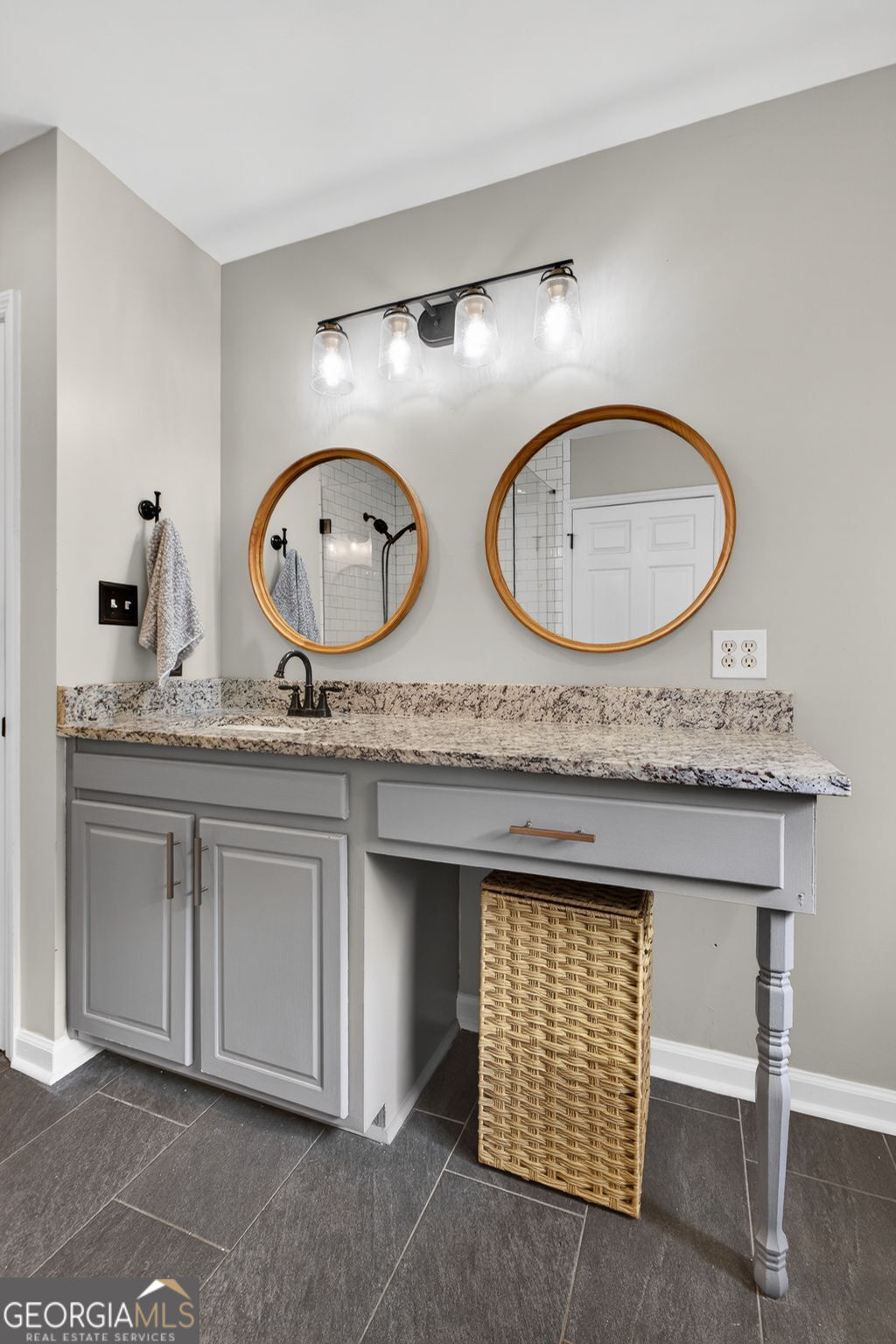 7581 Old Zebulon Road Molena, GA 30258 - Photo 36 of 79 a bathroom with a granite countertop sink and a mirror