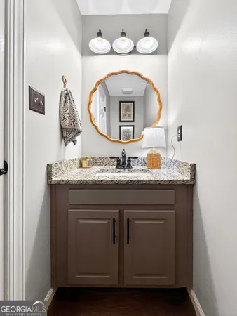 a swimming pool with outdoor seating and yard