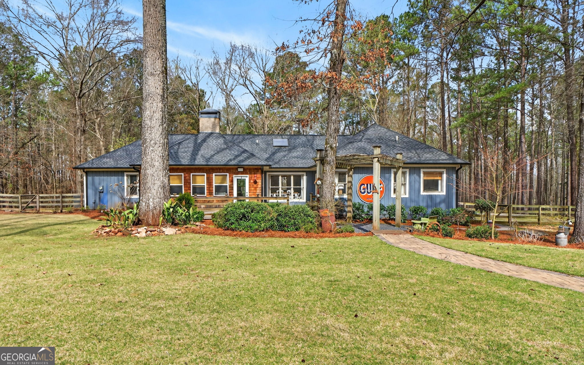 7581 Old Zebulon Road Molena, GA 30258 - Photo 5 of 79 a front view of a house with a yard