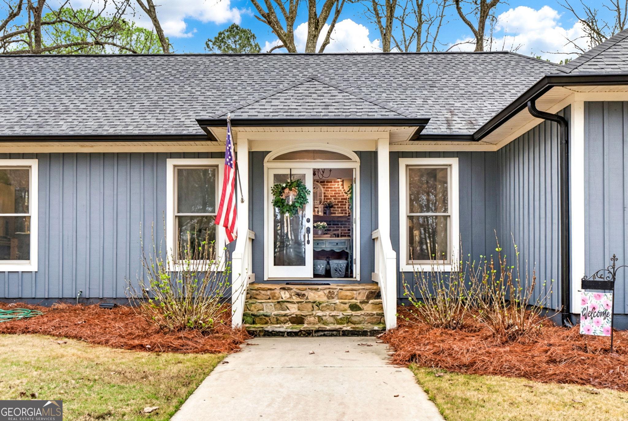 7581 Old Zebulon Road Molena, GA 30258 - Photo 6 of 79 a front view of a house with a outdoor space