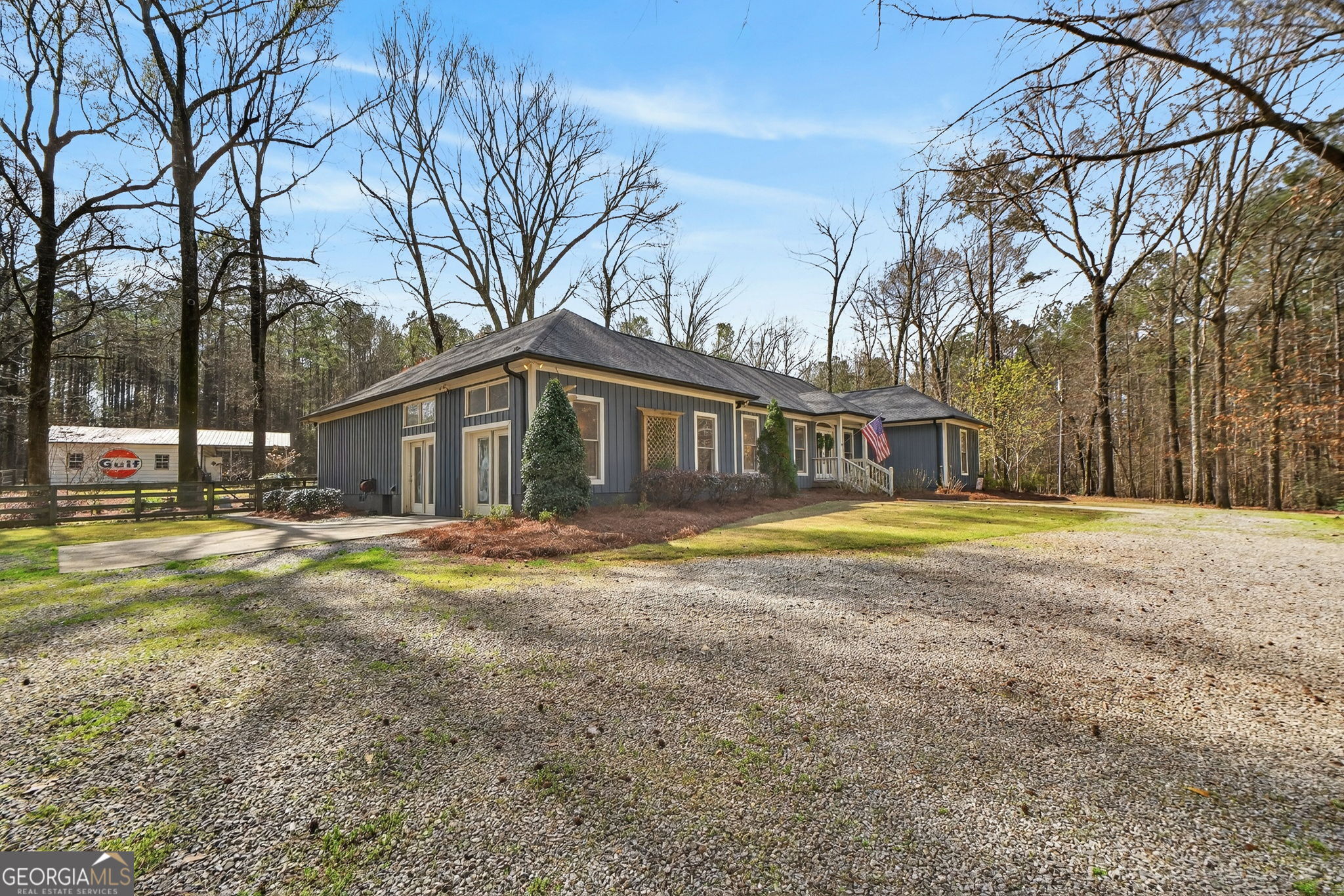 7581 Old Zebulon Road Molena, GA 30258 - Photo 65 of 79 a view of a house with swimming pool and sitting area