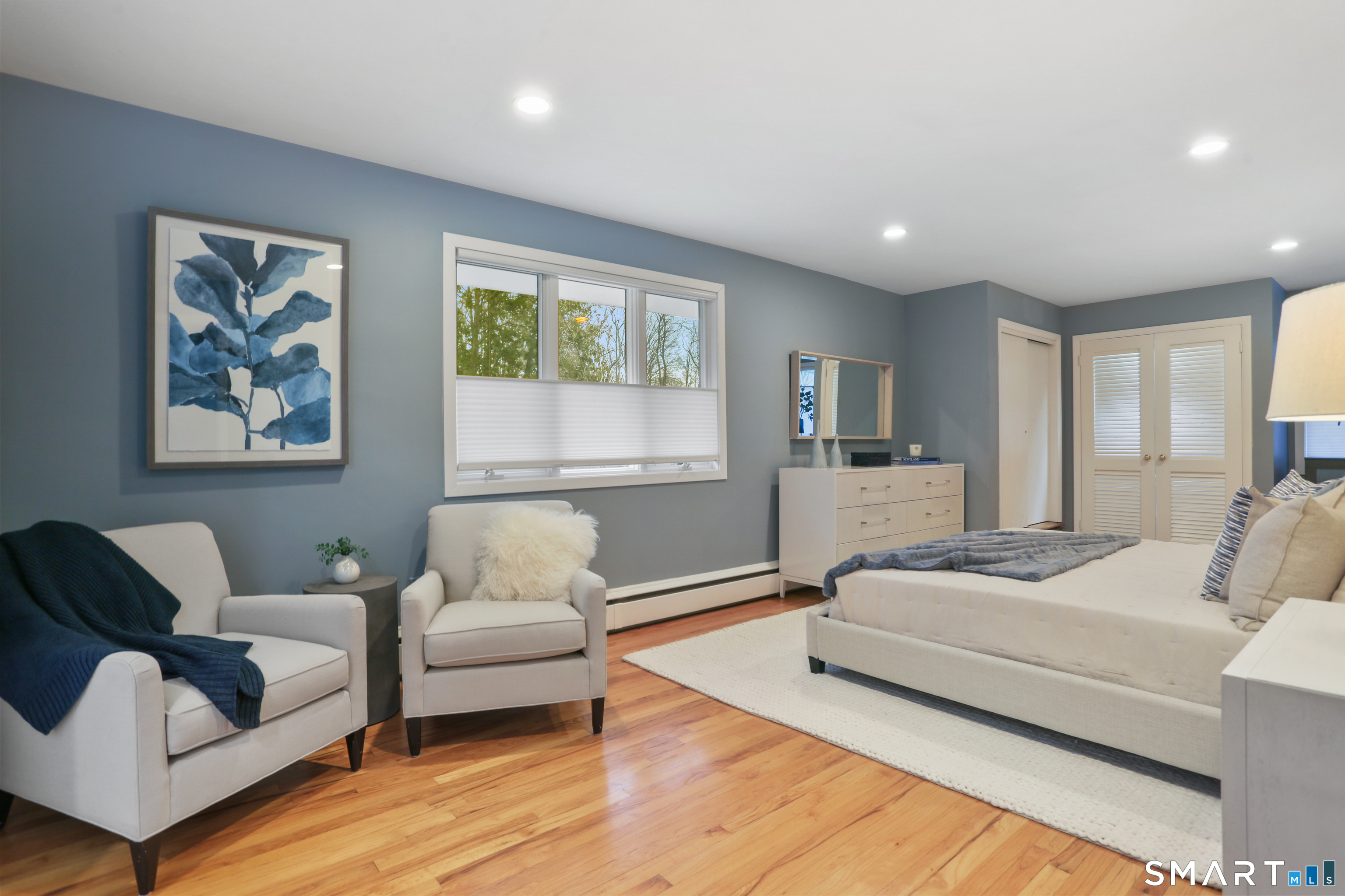 2 Rockyfield Road Westport, CT 06880 - Photo 2 of 40 Expansive primary bedroom on upper level with en-suite bathroom