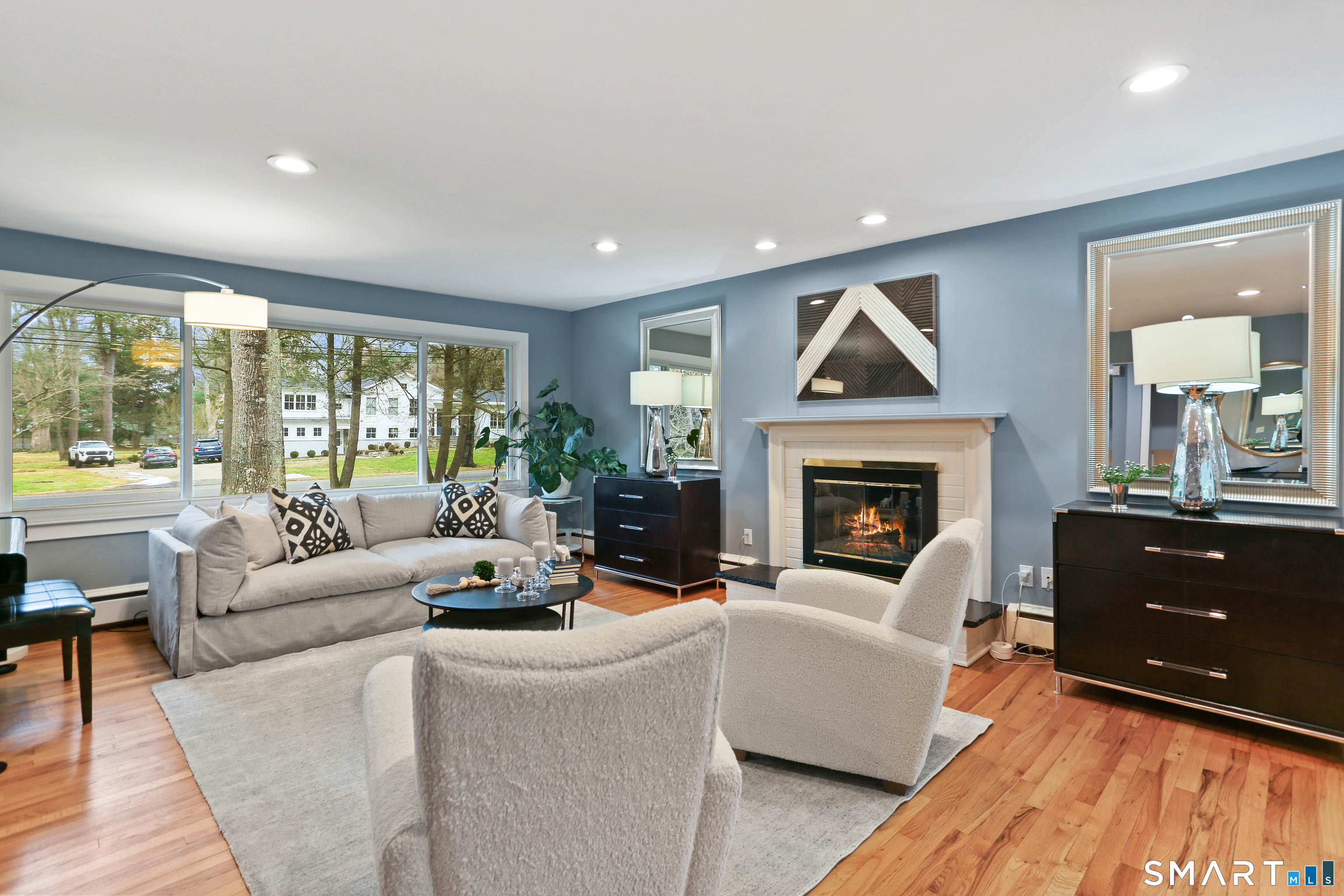 2 Rockyfield Road Westport, CT 06880 - Photo 4 of 40 A large fireplace is a lovely focal point of the living room